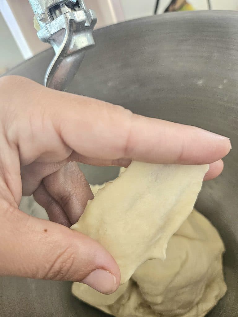 Window pane test on sourdough dough.