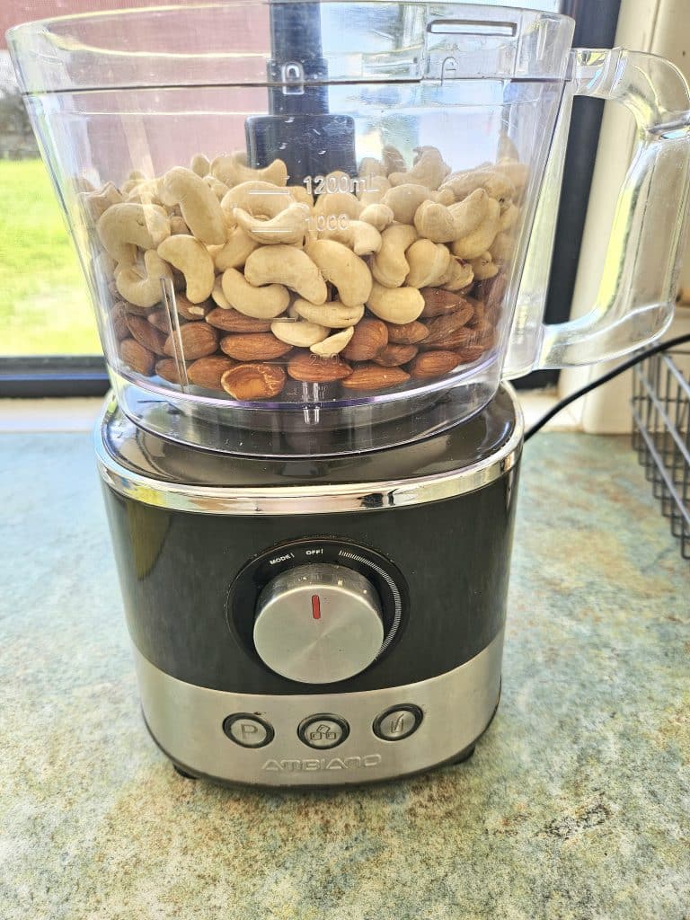 Blending nuts for homemade granola recipe.