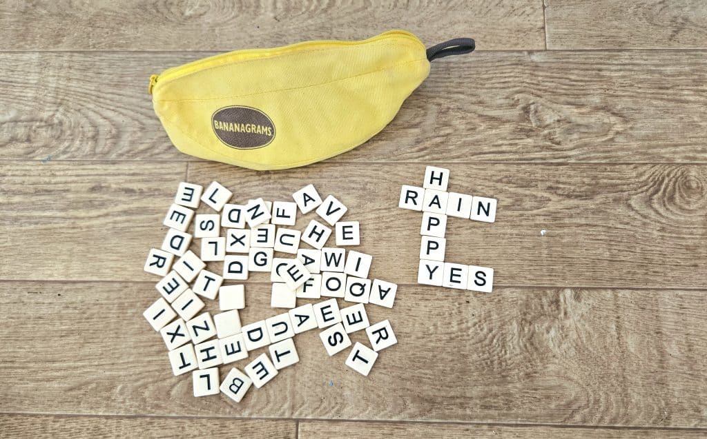 Bananagrams spelling words with tiles. 