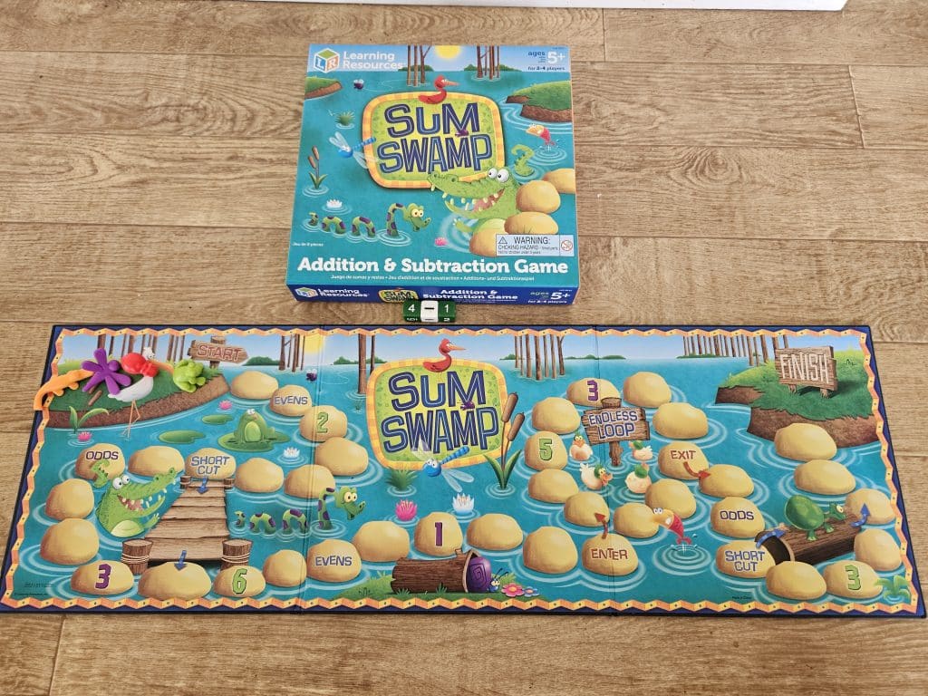 An educational math board game for kids learning addition and subtraction.