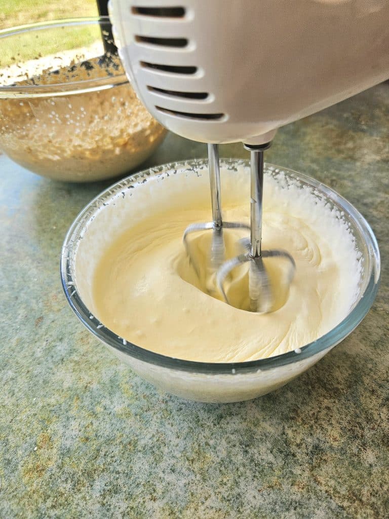 Whisking cream.