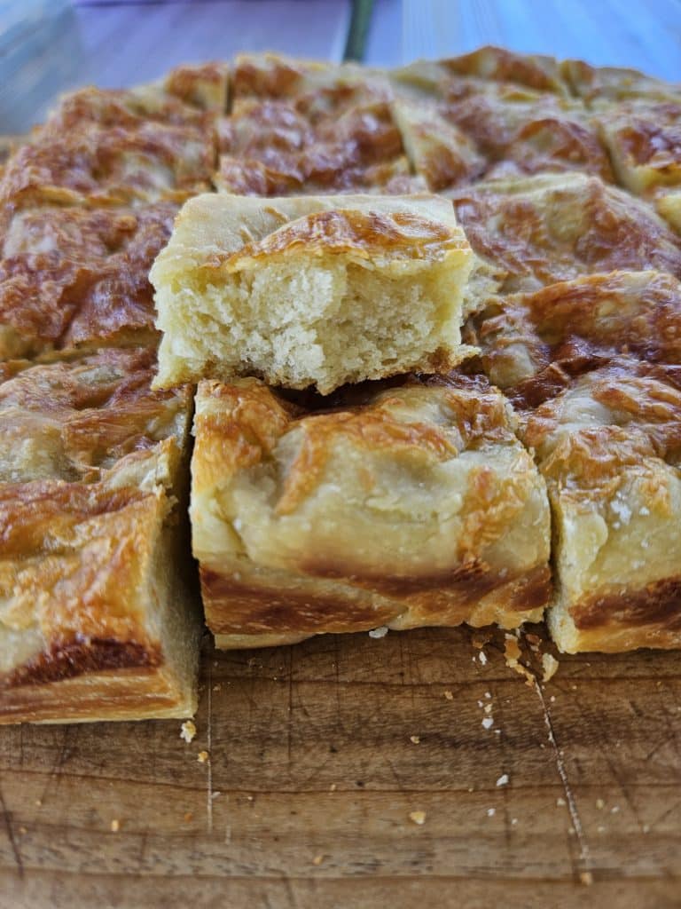 An easy sourdough discard focaccia recipe you are sure to love! Crunchy on the outside, light and fluffy on the inside. A perfect side dish or starter for any occasion!