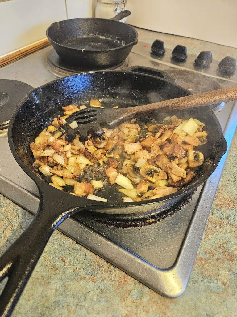 crustless chicken quiche ingredients being cooked.