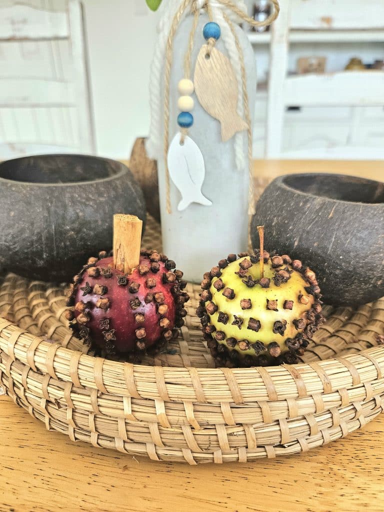 Making apple pomanders for autumn season.