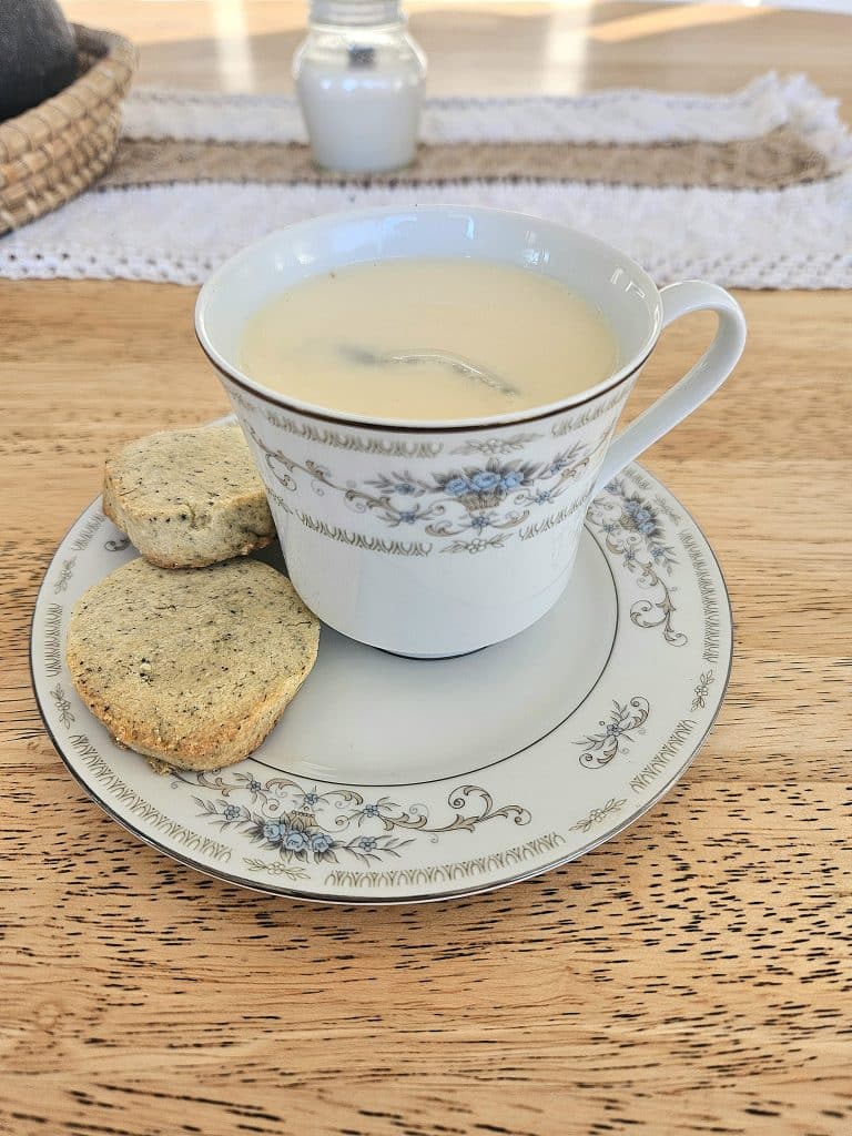 Tea and biscuits on a table.