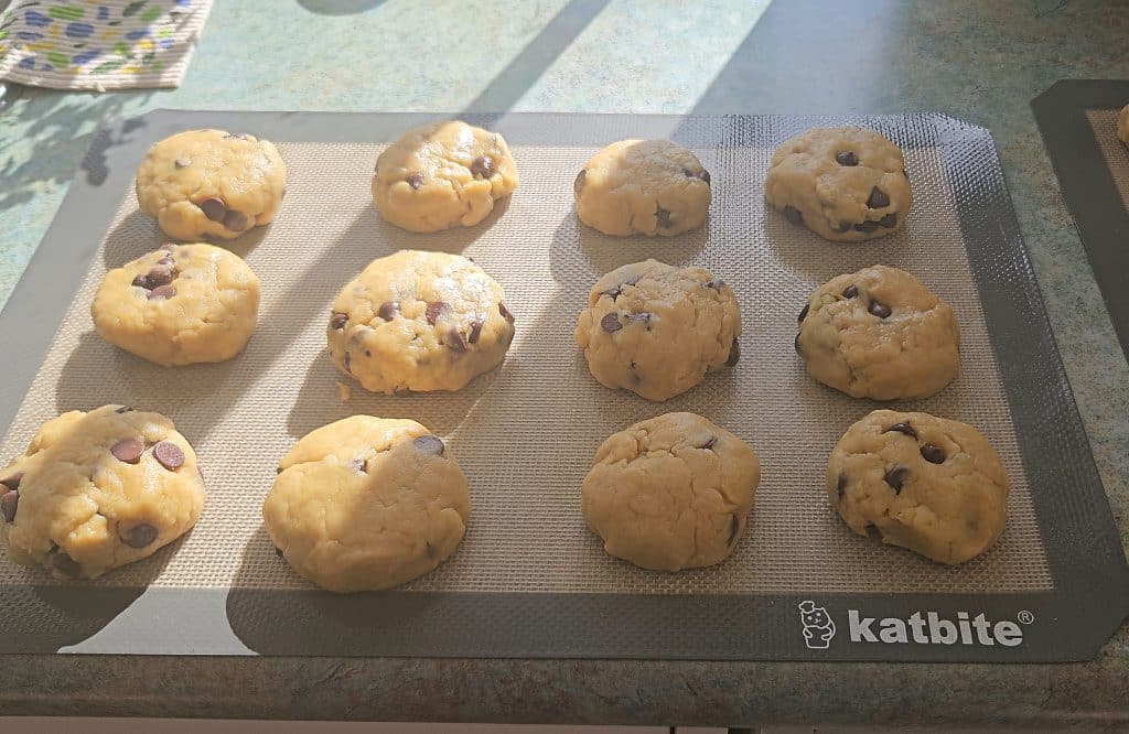 Sourdough cookies on a silicone mat.