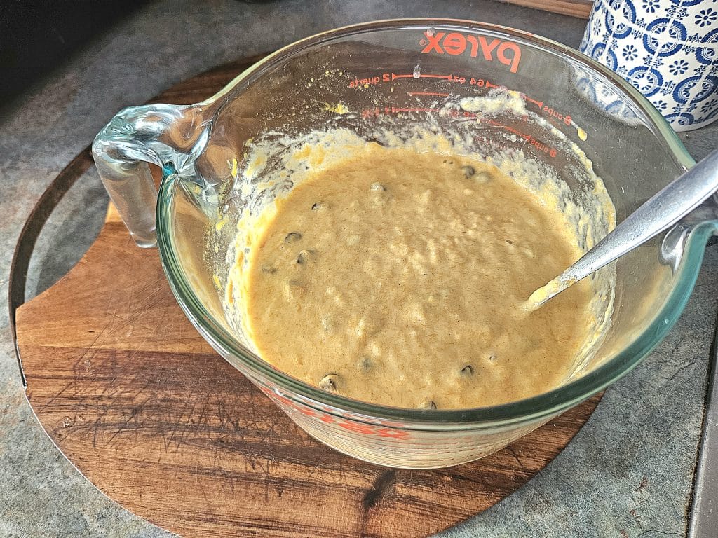 Sourdough pumpkin pancake batter in a Pyrex glass bowl. 