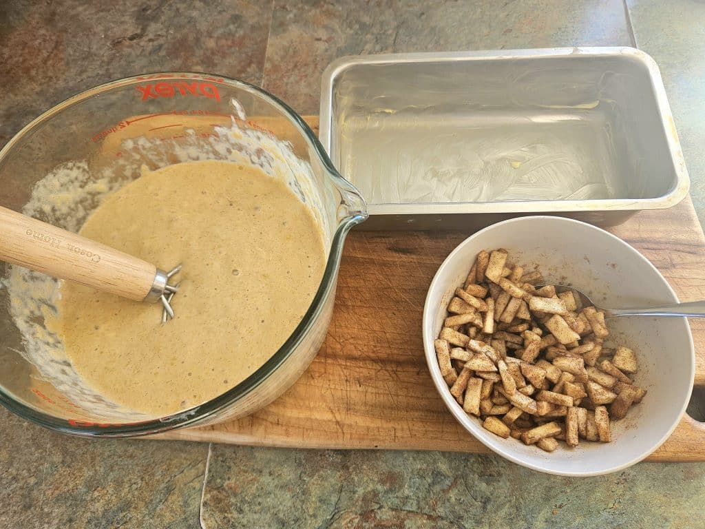 Sourdough discard apple loaf being prepped.