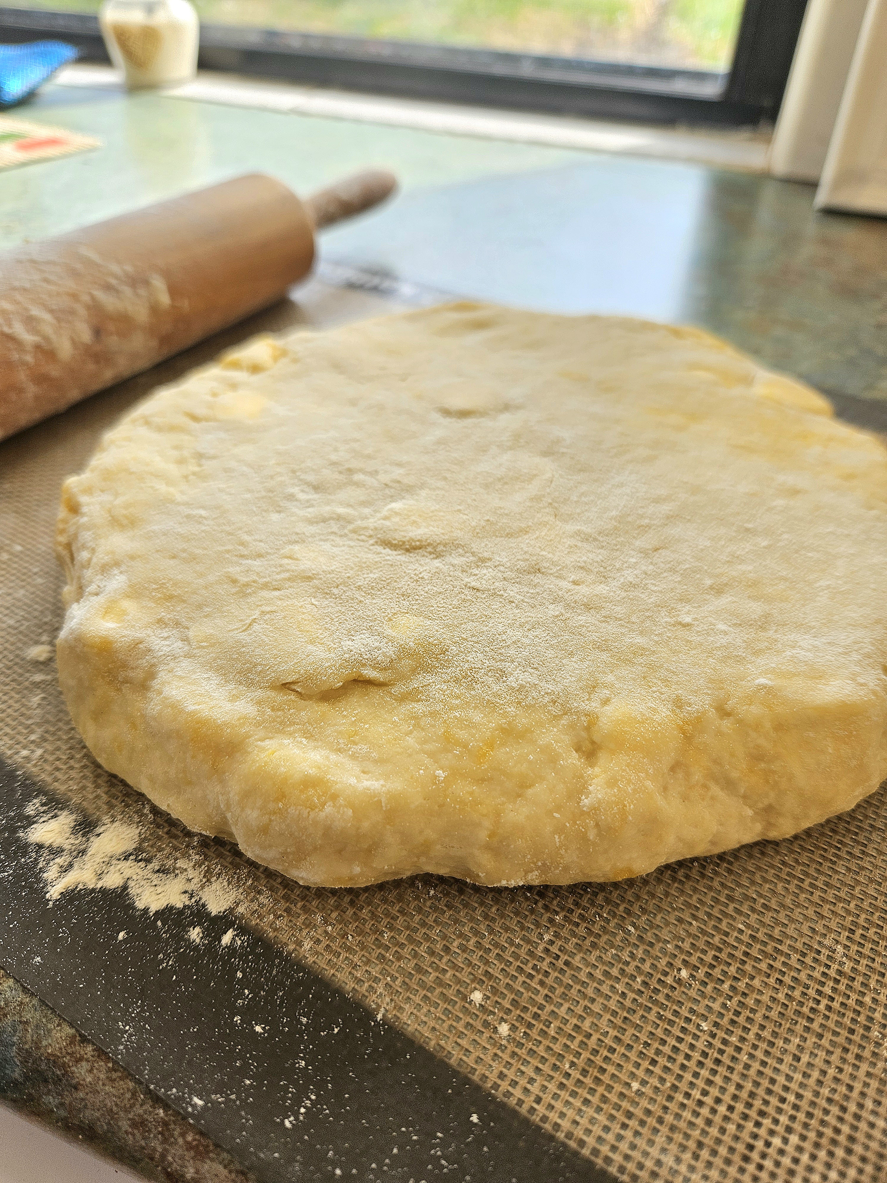 Sourdough scone dough flattened.