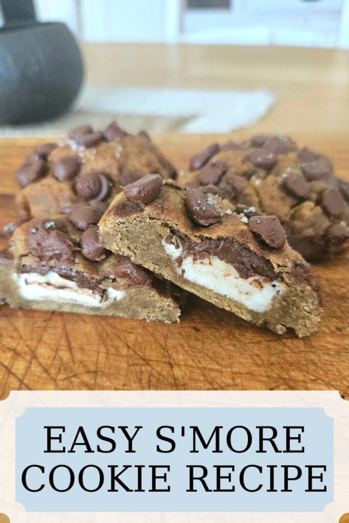 You will love this easy s'more cookie recipe that is filled with melted chocolate and gooey marshmallows. A delicious easy cookie recipe.