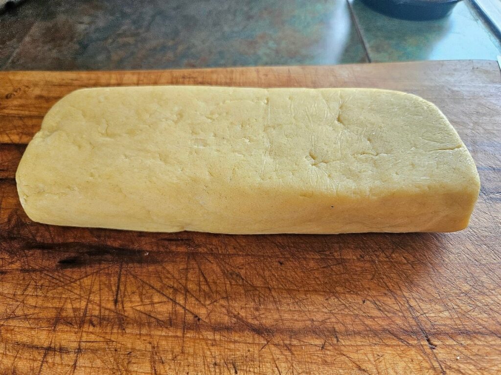 shortbread log on a cutting board.