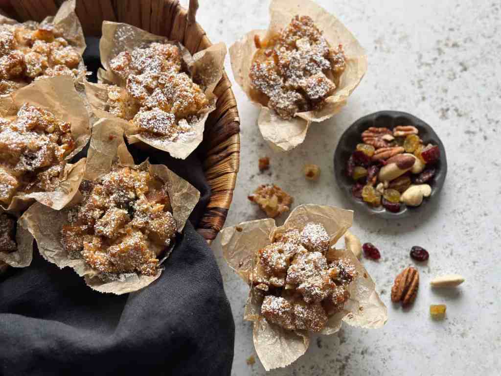 Sourdough bread pudding muffins served on a table.