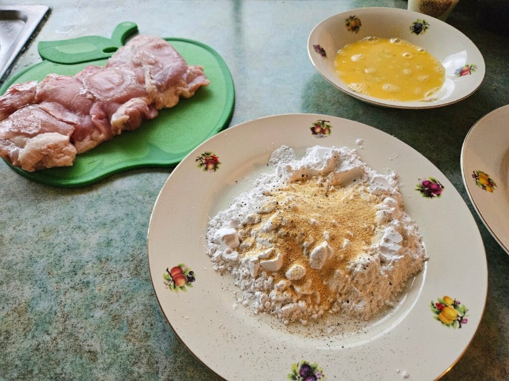 Chicken tender ingredients on a bench top.