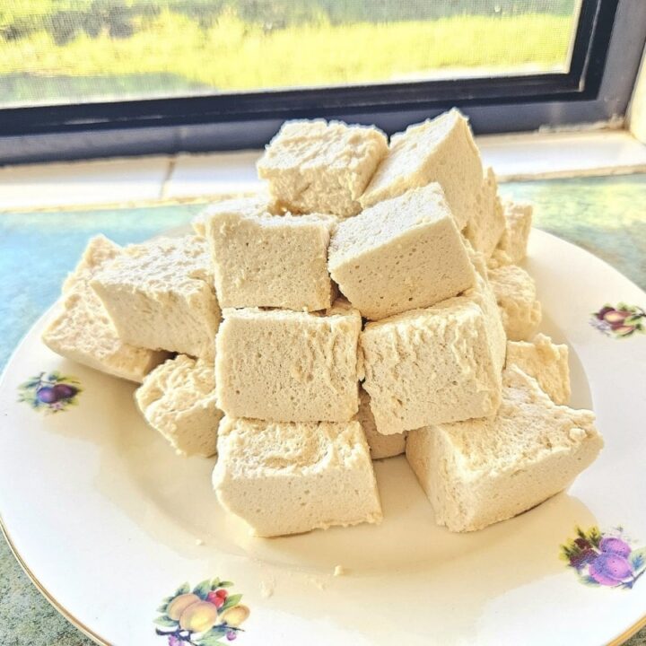 Fluffy Homemade marshmallows on a plate in the kitchen.