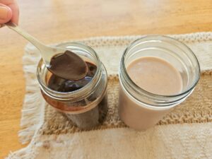 Homemade chocolate sauce in a jar.