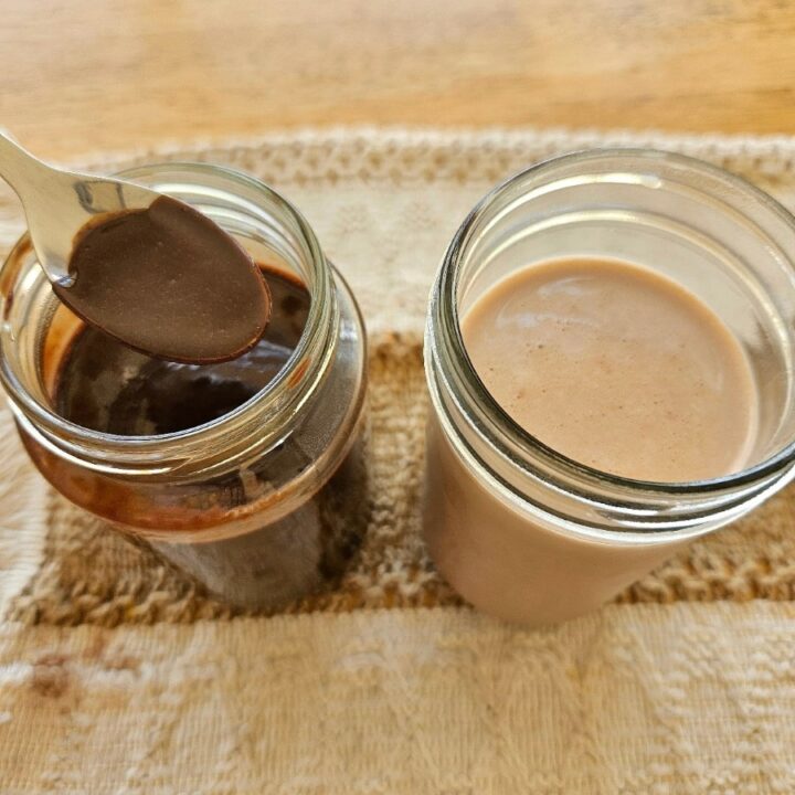 homemade chocolate syrup in a cup.