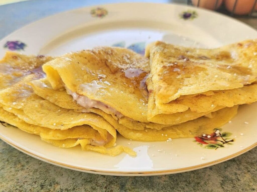 Homemade Sourdough Crepes on a plate.