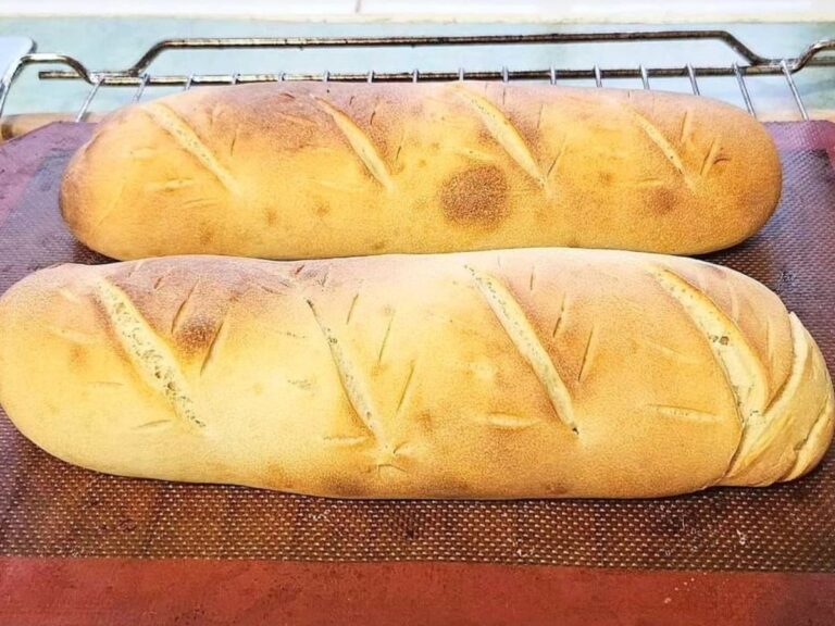 Sourdough French Bread cooling on silicon mat.