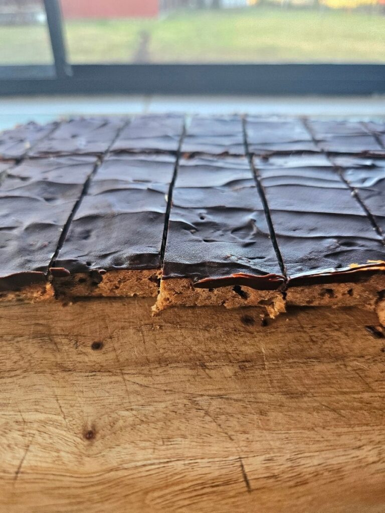 Sliced Healthy homemade granola bars on a cutting board.