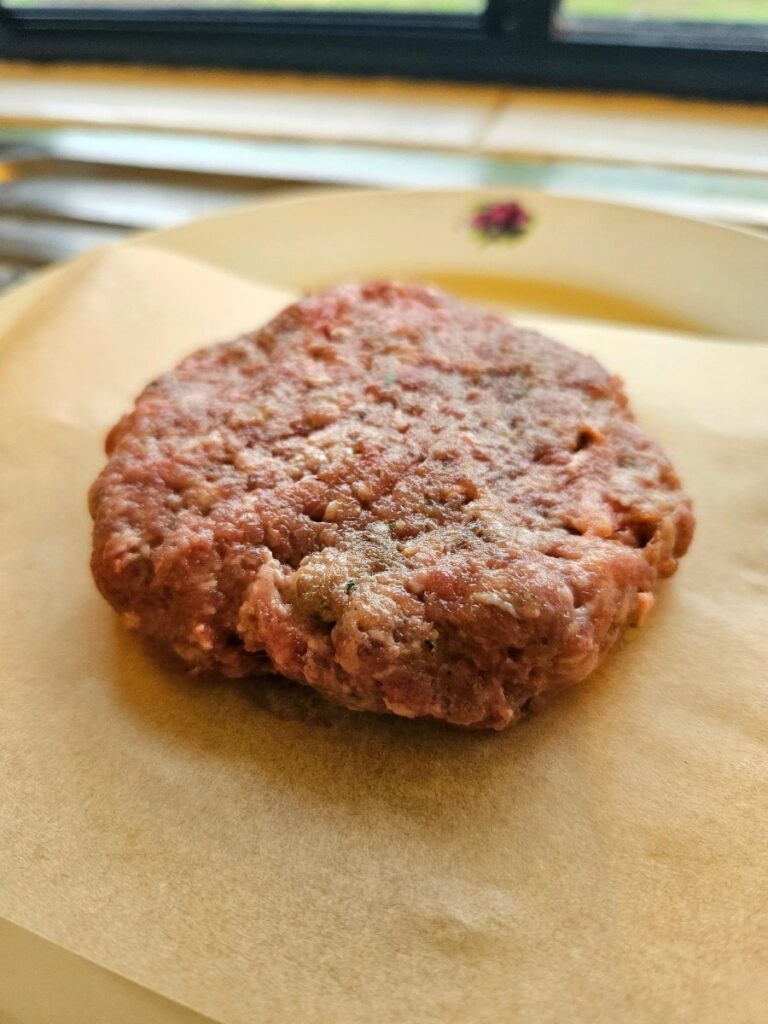 Storing extra hamburger patty for a later day.