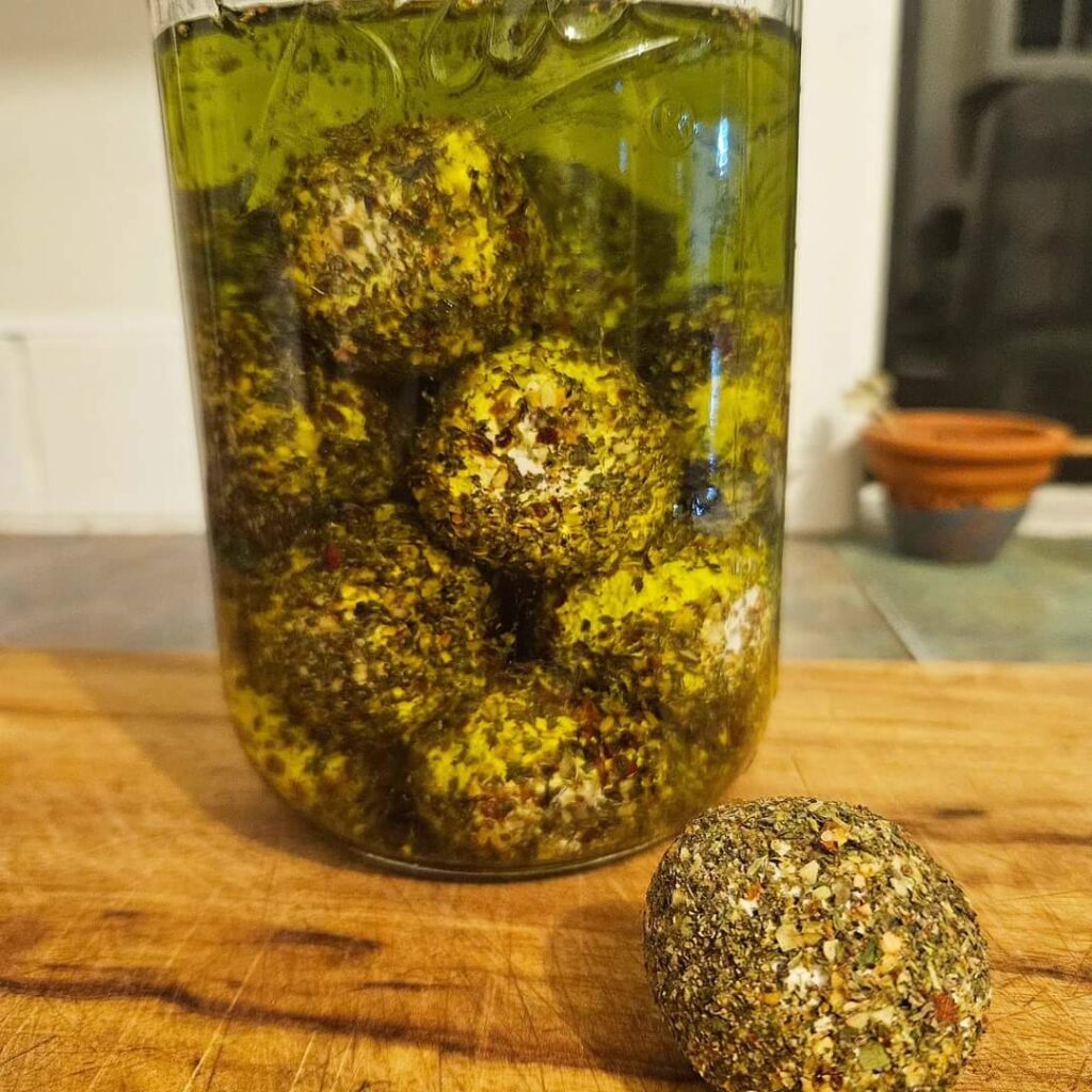 Kefir cheese balls preserved in olive oil.