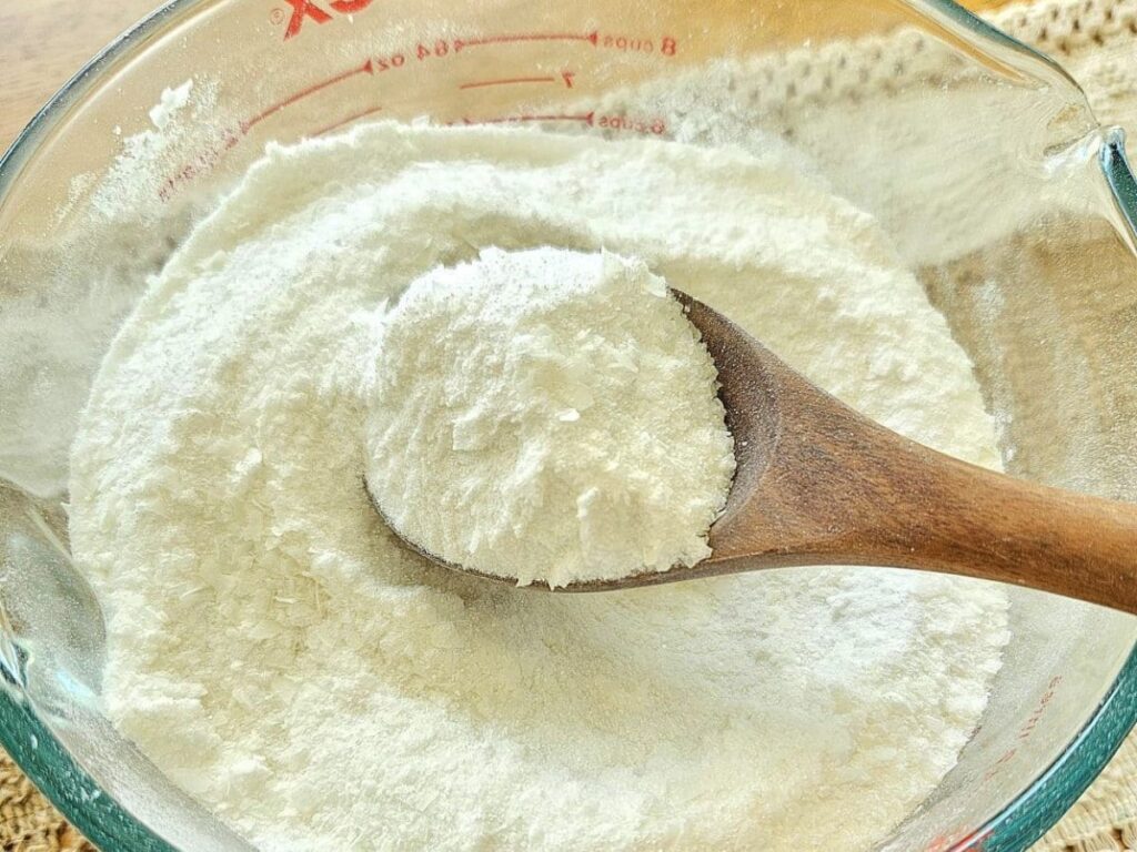 Laundry powder ingredients being mixed together.