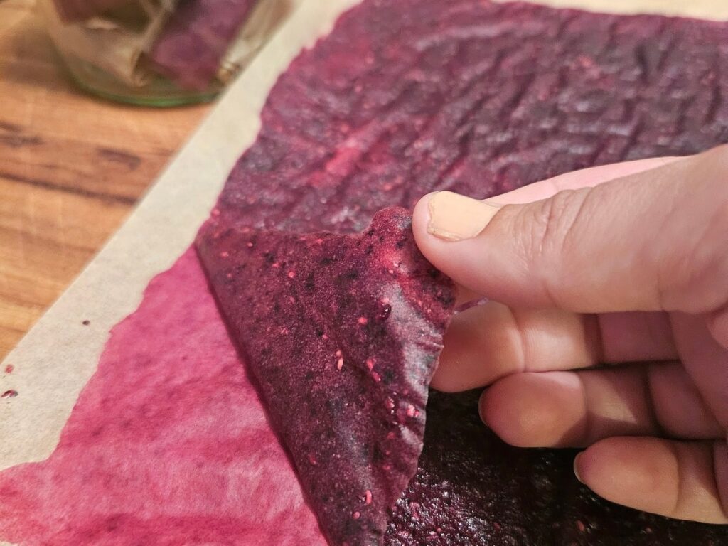 Fruit Leather being peeled.