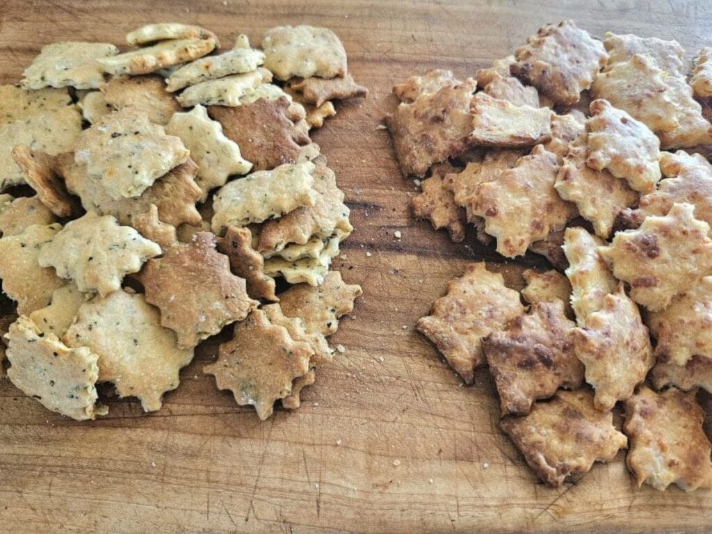 Crunchy sourdough crackers on a cutting board.