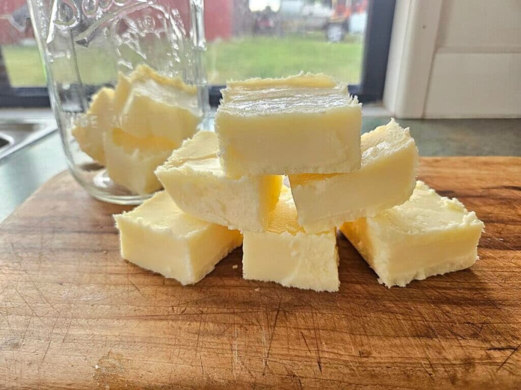 Easy homemade tallow about to be stored in glass containers.