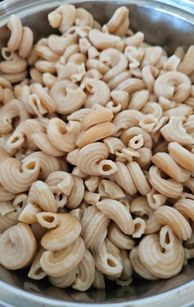 Cooked sourdough pasta in a pot.