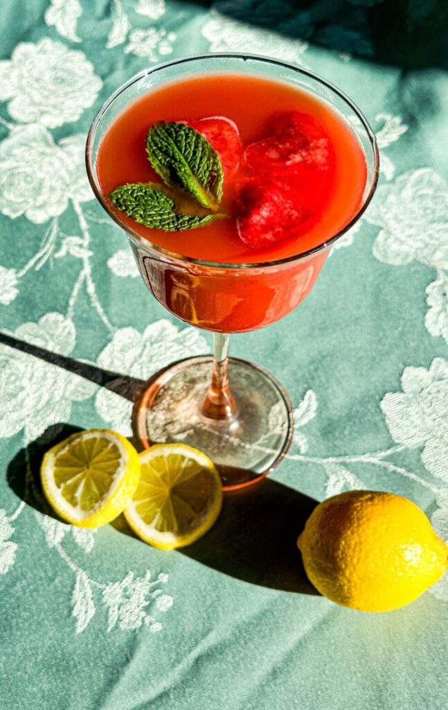 Strawberry cocktail in a glass cup.