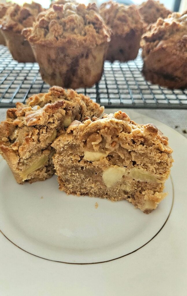 Apple crumble muffin cut in half.