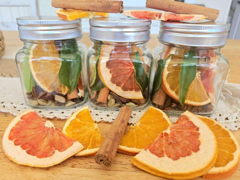 Beautiful homemade fall and winter jars filled with Potpourri.