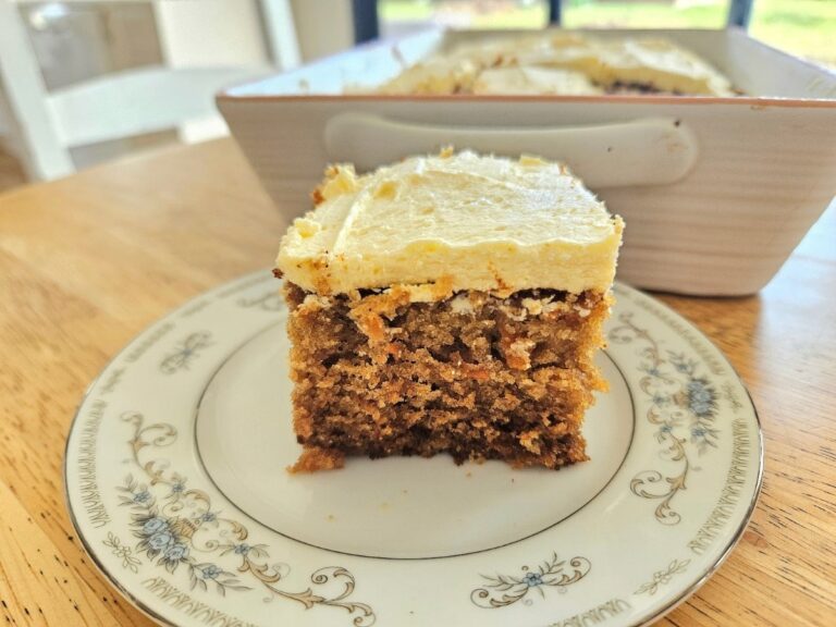 Homemade carrot cake served on a plate.