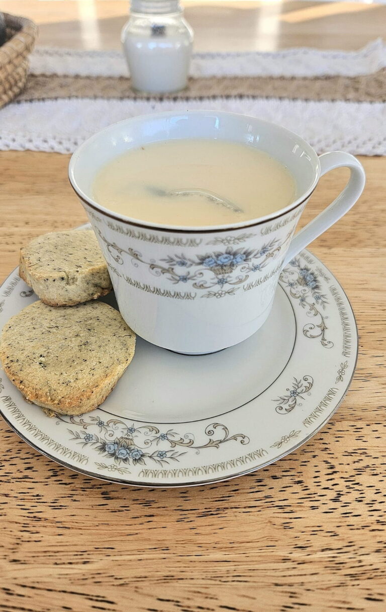 Tea and cookie on a saucer.