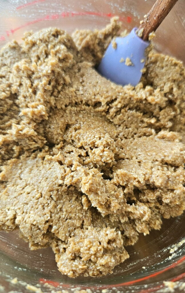 Mixing oat pie crust ingredients together.