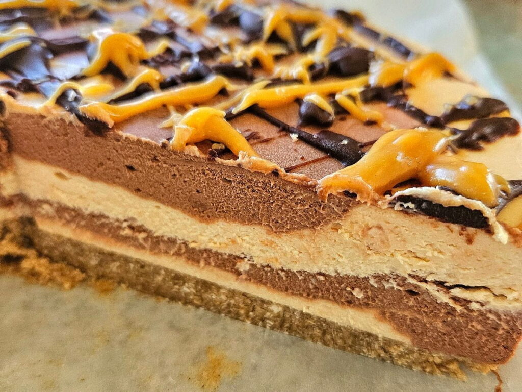 Healthy oat pie crust with cheesecake on top.