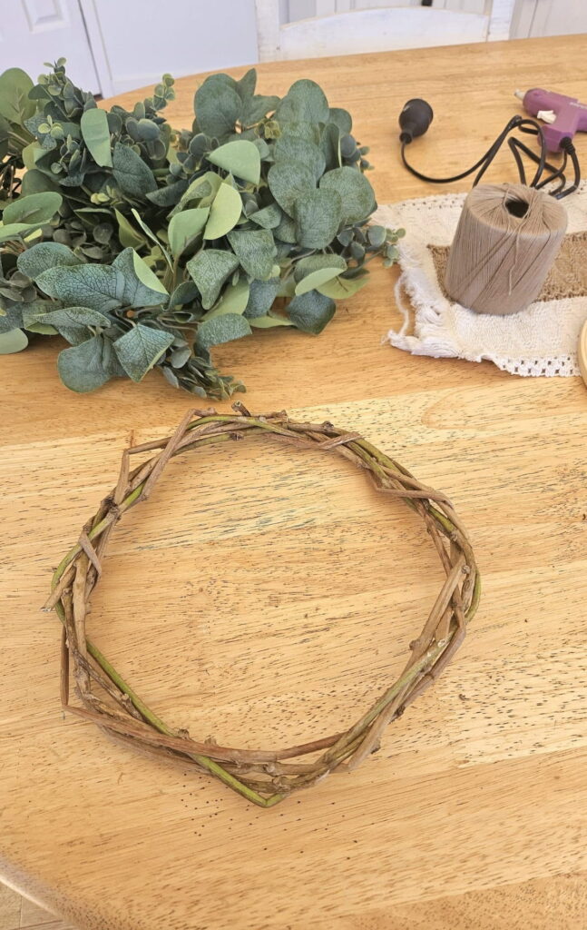 Wreath made from sweet potato vine and garland ready to be assembled.